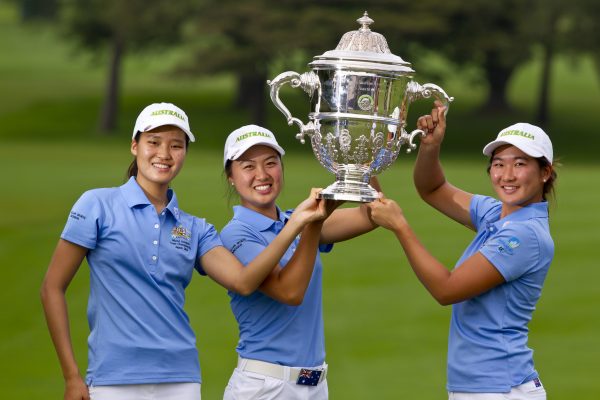 Australia team members Shelly Shin (left), Minjee Lee and Su Oh pose for photos with the trophy following the final round at the 2014 Espirito Santo Trophy at Karuizawa 72 Golf East in Karuizawa, Japan on Saturday, Sept. 6, 2014. (Copyright USGA/Steven Gibbons)