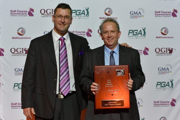 Charlie McGill (right) receives the GMA (Qld) manager of the year award from GMAQ president Aaron Muirhead.