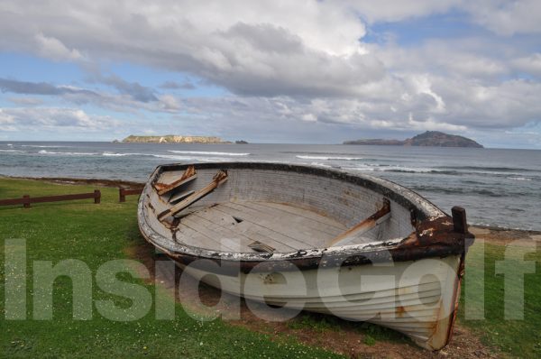 An old boat near the shore at Norfolk Island