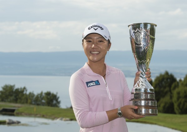 Lydia Ko with the Evian Championship trophy