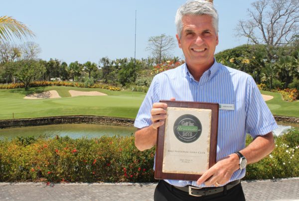 Bali National Golf Club general manager Mark Holland shows off the 2015 Renovation of the Year Award from Golf Inc.