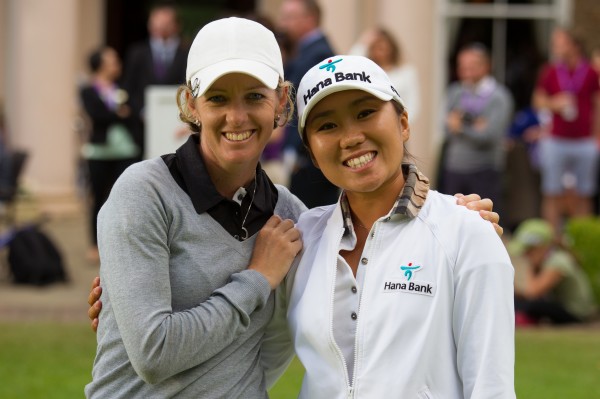Runner Up, Nikki Campbell and the winner In Kyung Kim pose for a photograph during the pize presentation