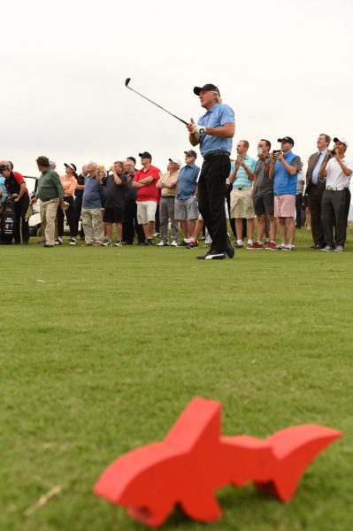 Norman tees off on the par-3 8th hole at Eastern Golf Club