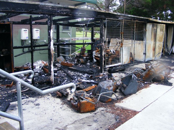 The smouldering ruins of Wallangarra Golf Club’s machinery shed